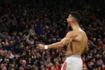 Cristiano Ronaldo strips off and shows off his muscles to celebrate after scoring a goal, very clear and beautiful pictures