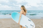 Beautiful girl in bikini holding surfboard picture desktop wallpaper
