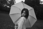Romantic and sexy photos of Wan Qian walking in the rain in the forest