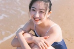 泳衣美女海边灵动诱人写真照图片