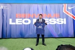 Messi shows off Paris team's new jersey photos