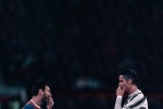 Messi and Ronaldo in the same field HD wallpaper