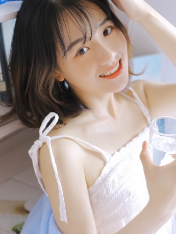 Sexy and fresh photo of beauty with short hair and suspender skirt