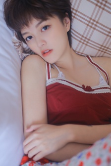 Beautiful girl with short hair and suspenders beautiful photo mobile wallpaper