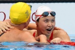 Chinese Canadian swimmer wins 100m butterfly