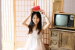 Japanese photography photo of a beautiful lady eating watermelon