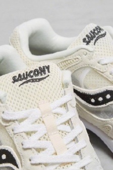 Saucony black and white two-tone retro running shoes display