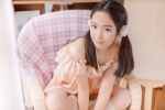 Photos of gentle and delicate beauty with beautiful legs in stockings at home