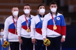 Very clear and beautiful pictures of the Russian men's gymnastics team awarding awards