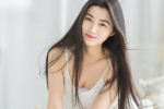 Sexy photo pictures of beauty with long hair in pajamas, strapless straps