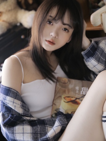 Sexy photo of beautiful girl in off-shoulder halter top