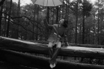 Romantic and sexy photos of Wan Qian walking in the rain in the forest