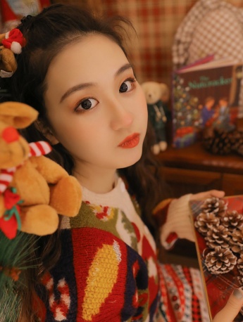 圣诞毛衣美女手机壁纸