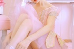 Beautiful photo of dance teacher in pink suspender gauze skirt