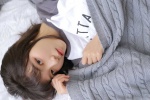 Sexy and charming photo of beautiful girl with beautiful legs on bed