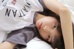 Sexy and charming photo of beautiful girl with beautiful legs on bed