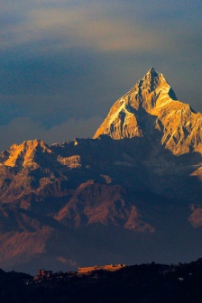 Beautiful sunset on distant mountain peaks mobile wallpaper