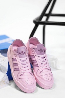 Adidas pink retro sneakers displayed from multiple angles