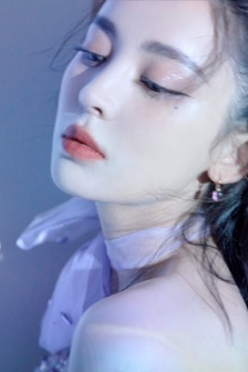 Charming and sexy photo of Nazha with curly hair and red lips