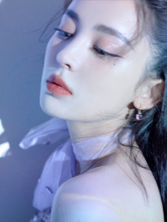 Charming and sexy photo of Nazha with curly hair and red lips