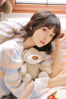 Beautiful girl in home pajamas mobile wallpaper