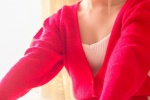 Photo of sexy pretty girl in red cardigan and low-cut suspender belt