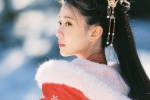 Qiao Xin's beautiful costume photo in the snow