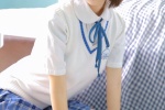 Sexy school girl beauty in miniskirt seductive photo