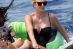 Charlize Theron new photos from sea vacation