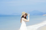 Summer seaside straw hat beauty mobile wallpaper