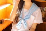 Sweet girl in uniform, seductive and sexy private room photo