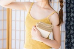 Sexy beauty model with suspender ponytail and eye-catching photo