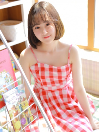 Charming and sexy photo of fair and tender beauty in beautiful suspender skirt