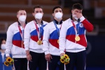 Very clear and beautiful pictures of the Russian men's gymnastics team awarding awards