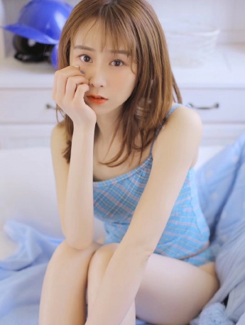 Sexy one-piece beauty with charming figure photo