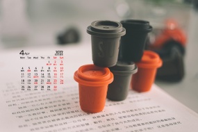 April 2022 books and coffee aesthetic desktop calendar wallpaper