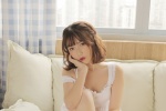 Seductive photo of charming and sexy beauty with fair skin and beautiful legs