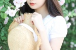夏季草帽美女唯美花海寫真圖片