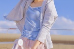 First love girl's cool summer photo with long legs in suspenders