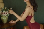 Charming beauty in red jumpsuit hot and sexy photo