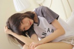 Sexy and charming photo of beautiful girl with beautiful legs on bed