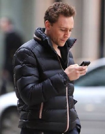 Marvel heroes looking at mobile phone emoticons