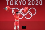 Chen Lijun wins gold medal in men's 67kg weightlifting class