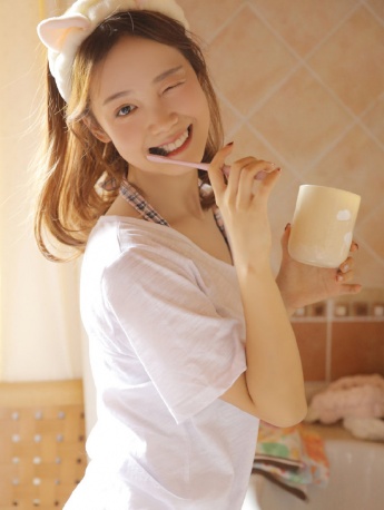 Playful and sexy photo of beautiful woman taking bath at home