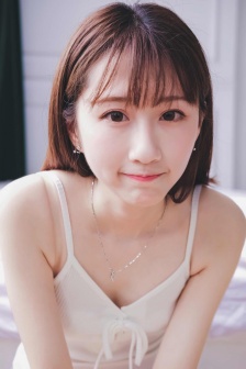 Sexy and charming photo of beautiful girl in suspender belt at home