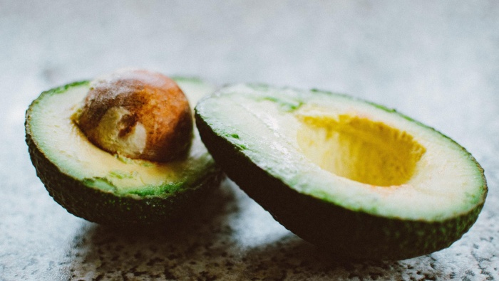 Delicious avocado cut in half picture desktop wallpaper