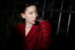 Charming photo of Li Sidani in burgundy coat