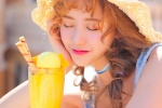 Summer outdoor photos of beauties in straw hats and low-cut legs