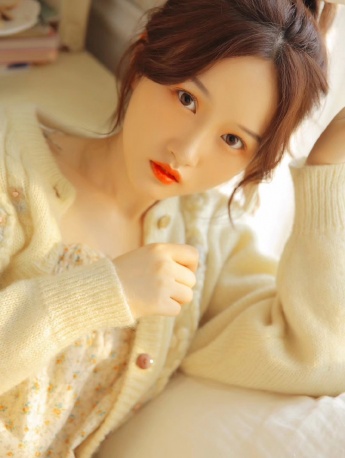 Sexy photo of beautiful woman with fair legs on bed