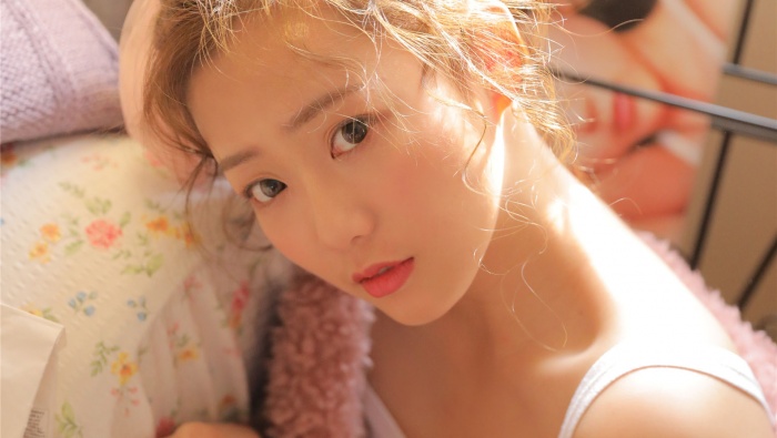 Charming beauty in suspenders photo wallpaper